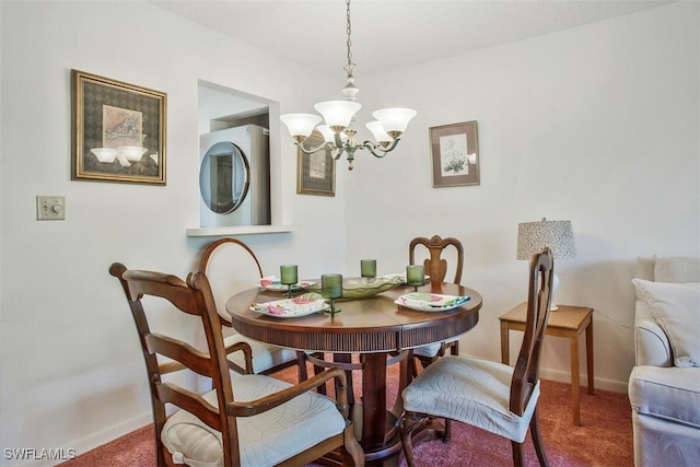 dining room featuring carpet flooring and a notable chandelier