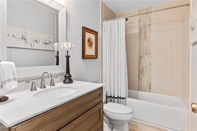 full bathroom featuring vanity, shower / bath combination with curtain, toilet, and wood-type flooring