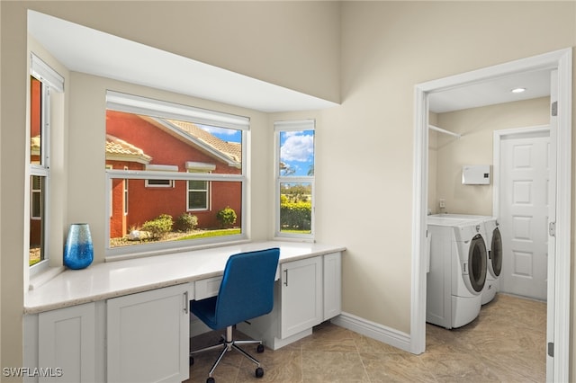 office featuring baseboards, washer and dryer, and built in study area