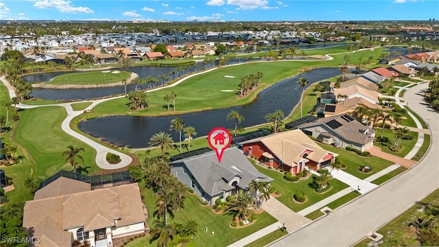 birds eye view of property featuring a residential view, view of golf course, and a water view