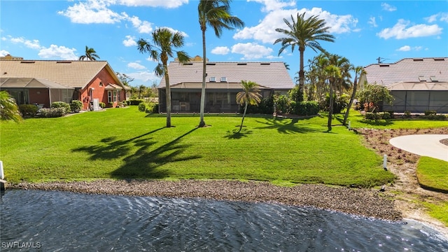 view of yard with a water view