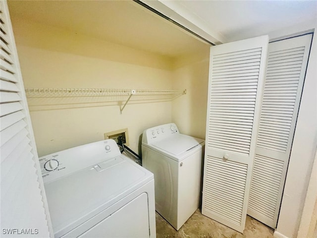 laundry area featuring laundry area and washer and dryer