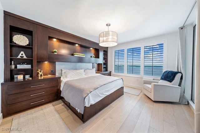 bedroom featuring light hardwood / wood-style flooring