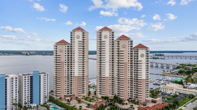 view of building exterior with a water view