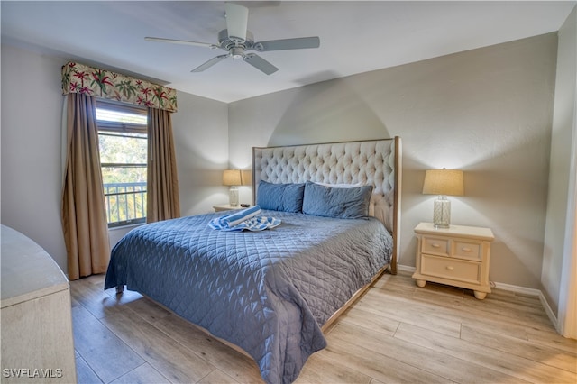 bedroom featuring light hardwood / wood-style floors and ceiling fan