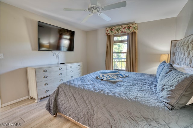 bedroom featuring ceiling fan and light hardwood / wood-style flooring