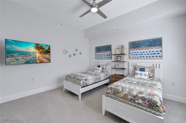 bedroom with ceiling fan and carpet flooring