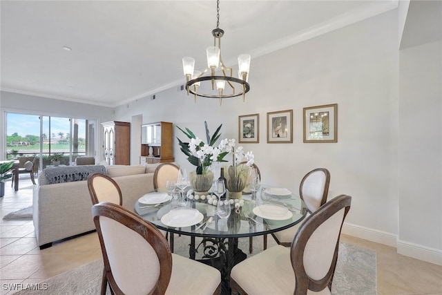 dining area featuring an inviting chandelier, crown molding, and light tile patterned floors