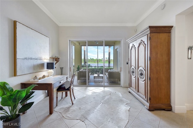 interior space featuring ornamental molding and light tile patterned floors