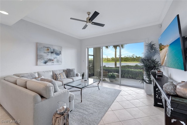 living room featuring ceiling fan, ornamental molding, and light tile patterned floors