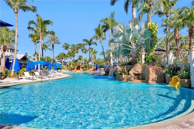 view of pool featuring a patio and pool water feature