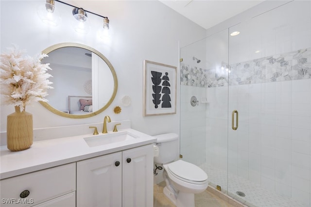 bathroom with walk in shower, vanity, and toilet