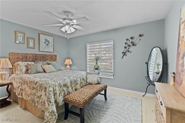 tiled bedroom with ceiling fan