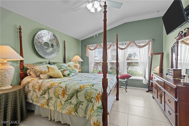 tiled bedroom featuring ceiling fan and vaulted ceiling