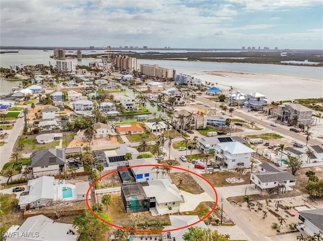 bird's eye view with a water view