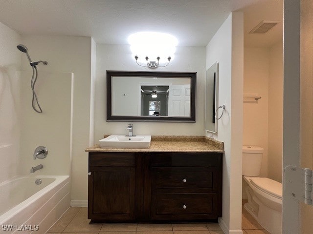 full bathroom with vanity, shower / tub combination, tile patterned flooring, and toilet