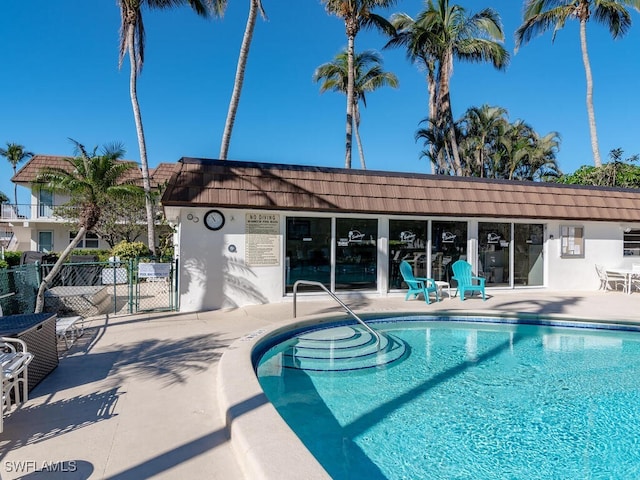 view of pool featuring a patio area