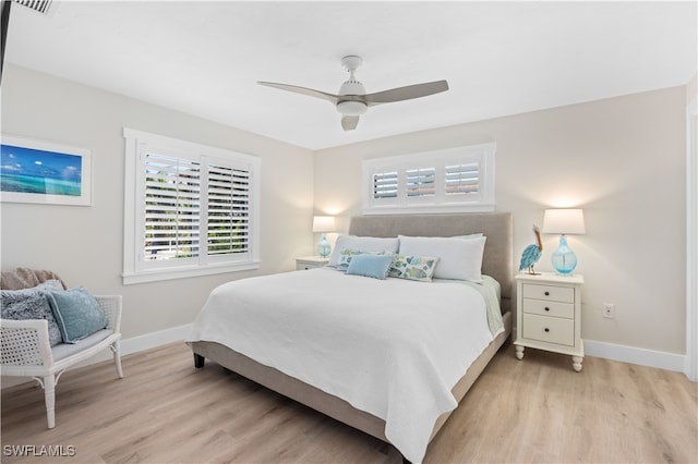 bedroom featuring ceiling fan and light hardwood / wood-style floors