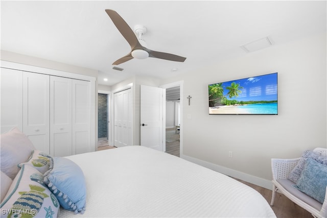 bedroom with ceiling fan and hardwood / wood-style flooring