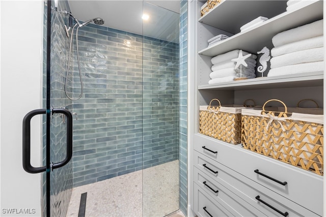 bathroom featuring an enclosed shower