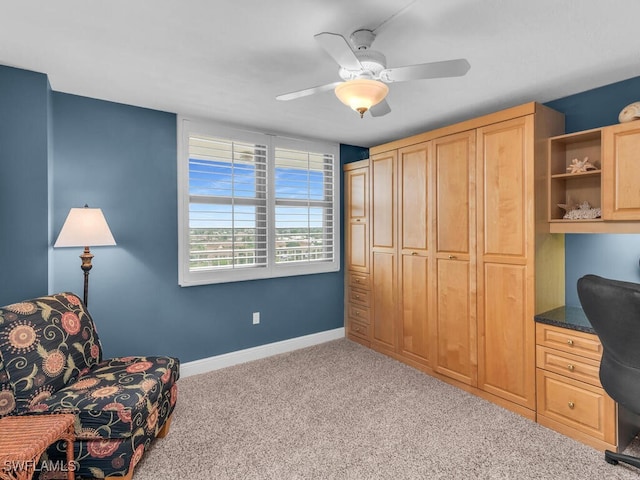 260 Seaview Ct Unit 803, Marco Island, FL 34145 - interior space featuring built in desk, baseboards, ceiling fan, and carpet flooring