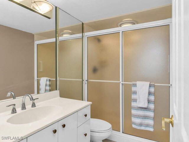 260 Seaview Ct Unit 803, Marco Island, FL 34145 - full bath featuring toilet, vanity, and a shower with door
