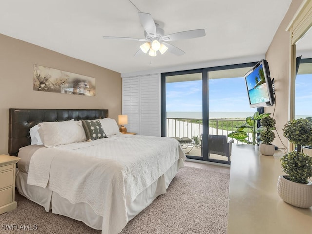 260 Seaview Ct Unit 803, Marco Island, FL 34145 - carpeted bedroom with a ceiling fan, access to outside, and multiple windows