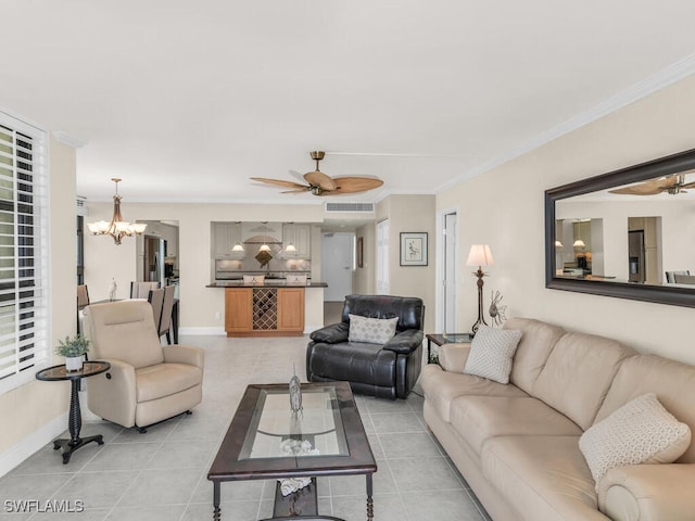 260 Seaview Ct Unit 803, Marco Island, FL 34145 - living area with baseboards, light tile patterned floors, ceiling fan with notable chandelier, and ornamental molding