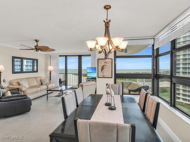 260 Seaview Ct Unit 803, Marco Island, FL 34145 - tiled dining space featuring ceiling fan with notable chandelier