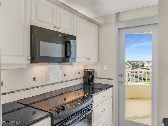260 Seaview Ct Unit 803, Marco Island, FL 34145 - kitchen with black appliances, dark stone counters, white cabinets, and backsplash