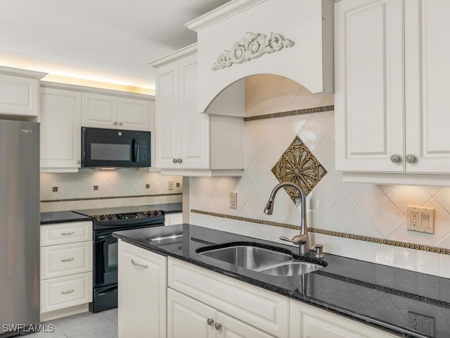 260 Seaview Ct Unit 803, Marco Island, FL 34145 - kitchen featuring black appliances, a sink, white cabinetry, and decorative backsplash