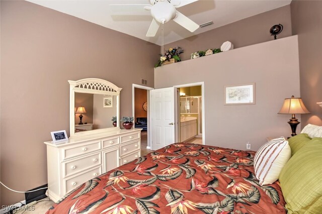 bedroom with ceiling fan and ensuite bathroom