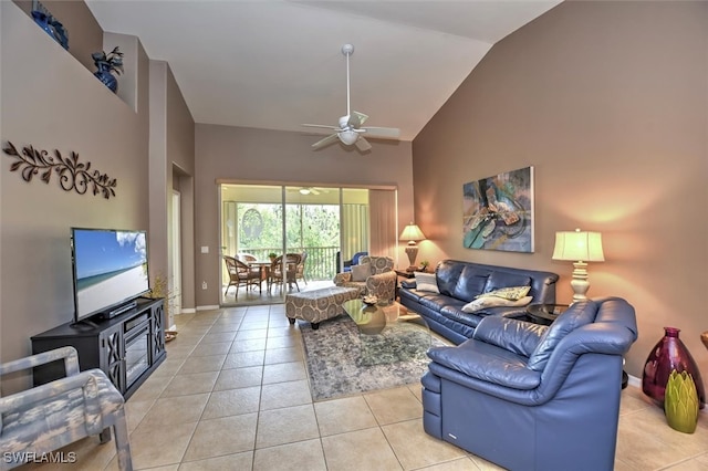 living room with light tile patterned flooring, ceiling fan, and high vaulted ceiling