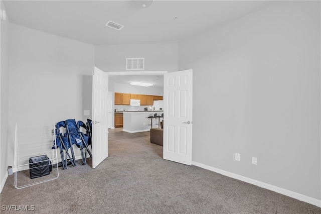 interior space featuring carpet flooring