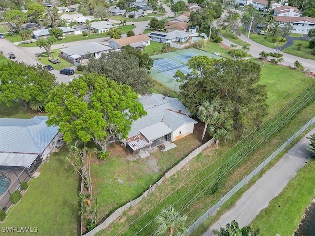 birds eye view of property with a residential view