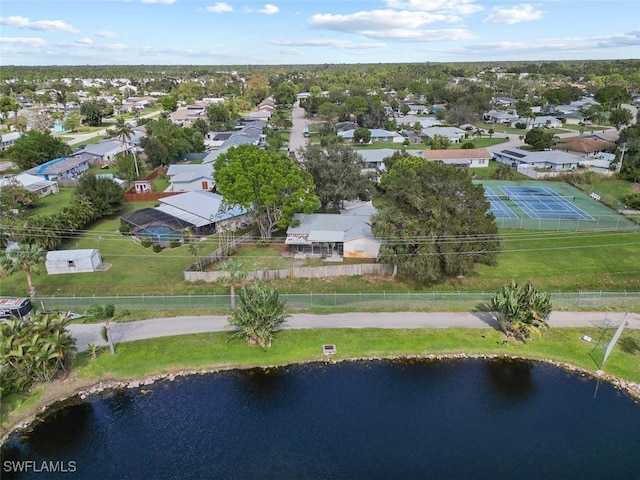 bird's eye view featuring a residential view and a water view