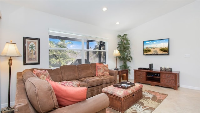 tiled living room with vaulted ceiling