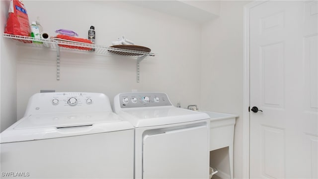 laundry area featuring separate washer and dryer