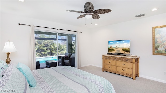 bedroom featuring access to outside, light carpet, and ceiling fan