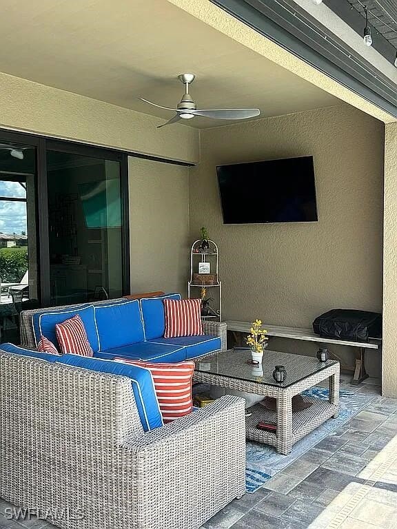 view of patio / terrace with outdoor lounge area and ceiling fan