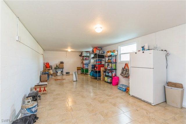 interior space featuring white refrigerator