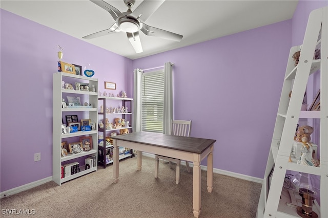 carpeted home office with ceiling fan