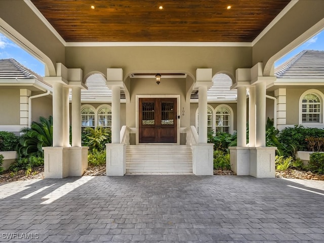 property entrance featuring french doors