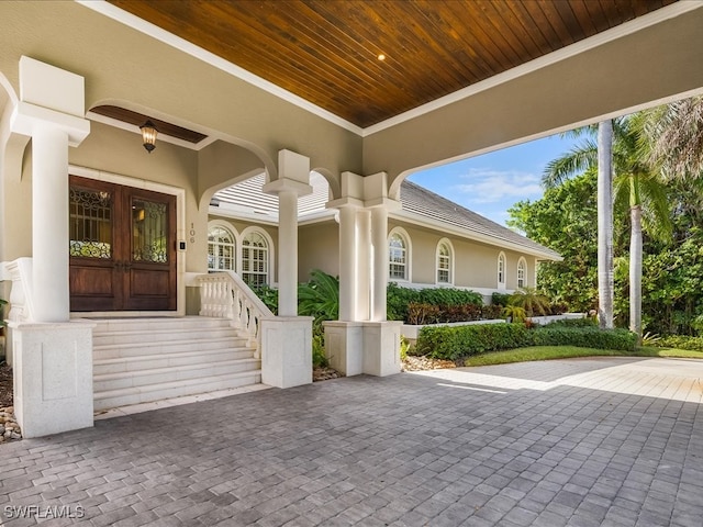 property entrance featuring french doors