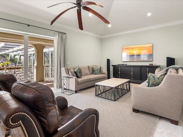 living room with ceiling fan and crown molding