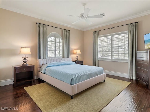 bedroom with ceiling fan, crown molding, dark wood-type flooring, and multiple windows