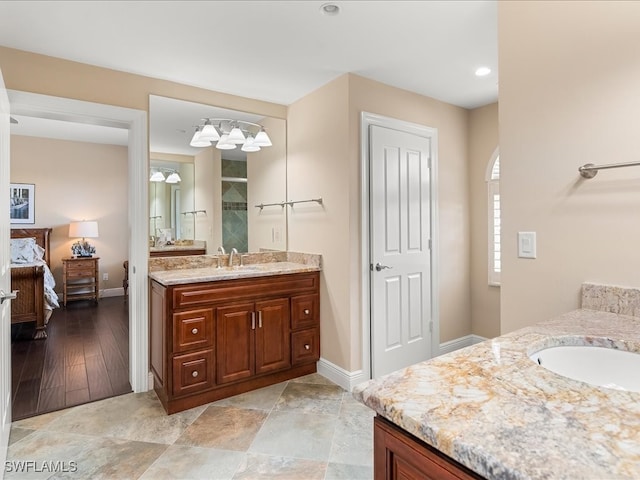 bathroom featuring hardwood / wood-style floors and vanity