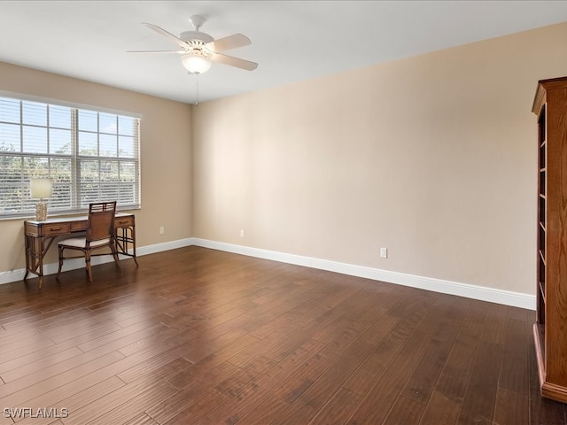 office area with ceiling fan and dark hardwood / wood-style flooring