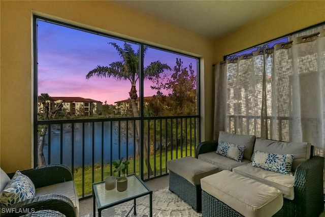 sunroom with a water view