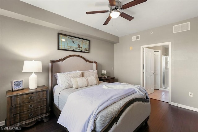 bedroom featuring a ceiling fan, dark wood-style flooring, visible vents, and baseboards